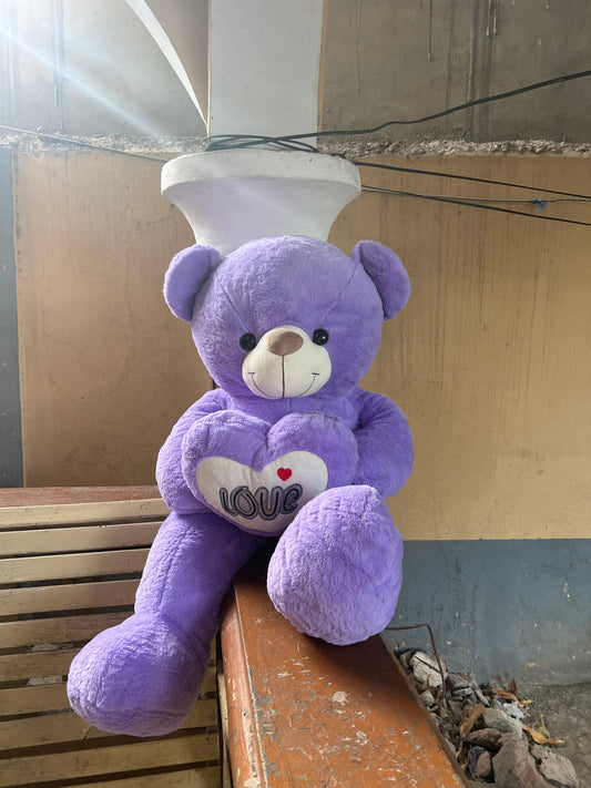 Peluche avec un cœur sur la poitrine 1m25